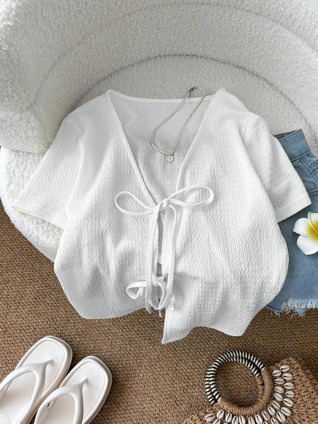 white textured front knot short sleeve blouse