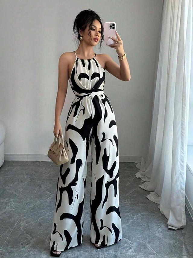 black and white abstract print sleeveless cinched waist jumpsuit