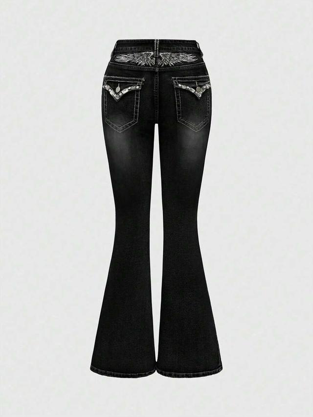 black rhinestone embroidered wing flared low waist jeans