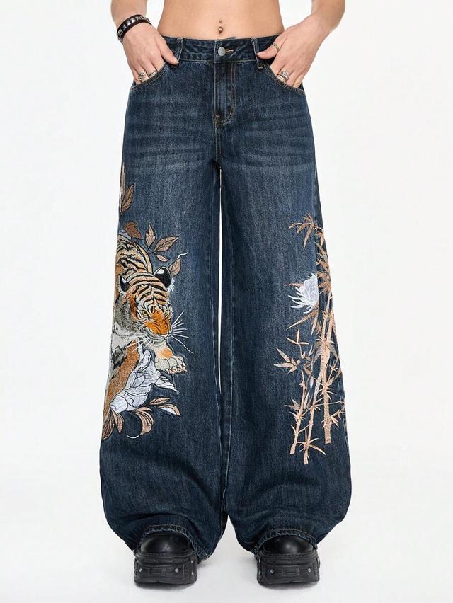 dark wash wide leg jeans with tiger embroidery