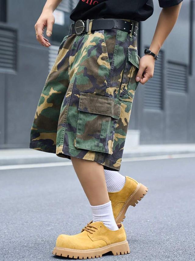 camouflage denim cargo shorts with multi-pocket utility design