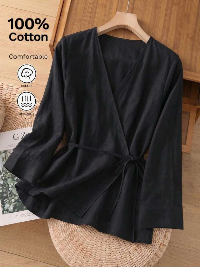 women's solid black cotton v-neck tie-up wrap top