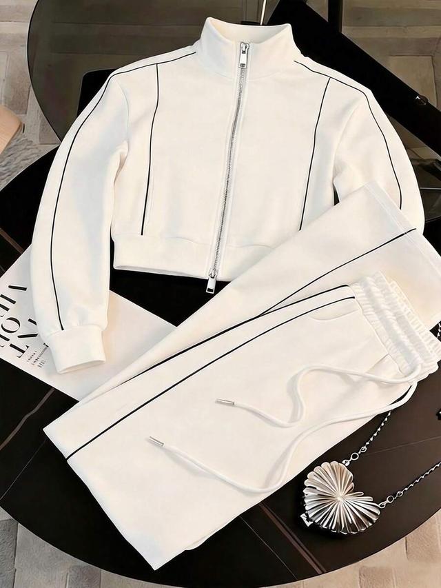 white casual zipper collar hoodie and trouser set