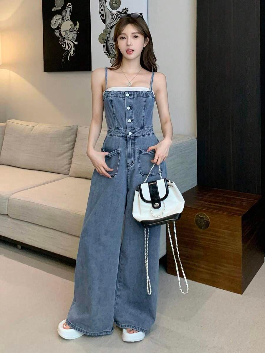 women denim jumpsuit with button front and patch pockets
