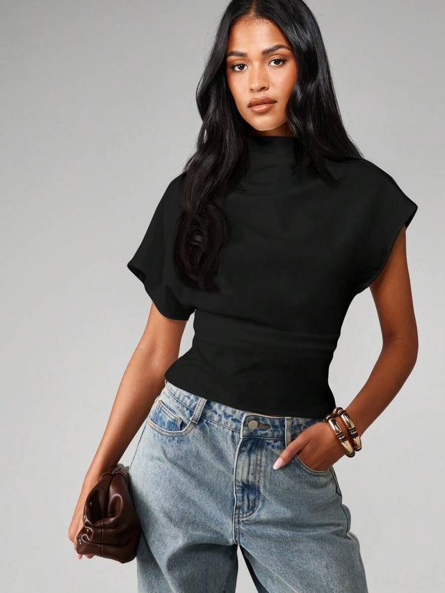 black mock neck short sleeve cinched waist top