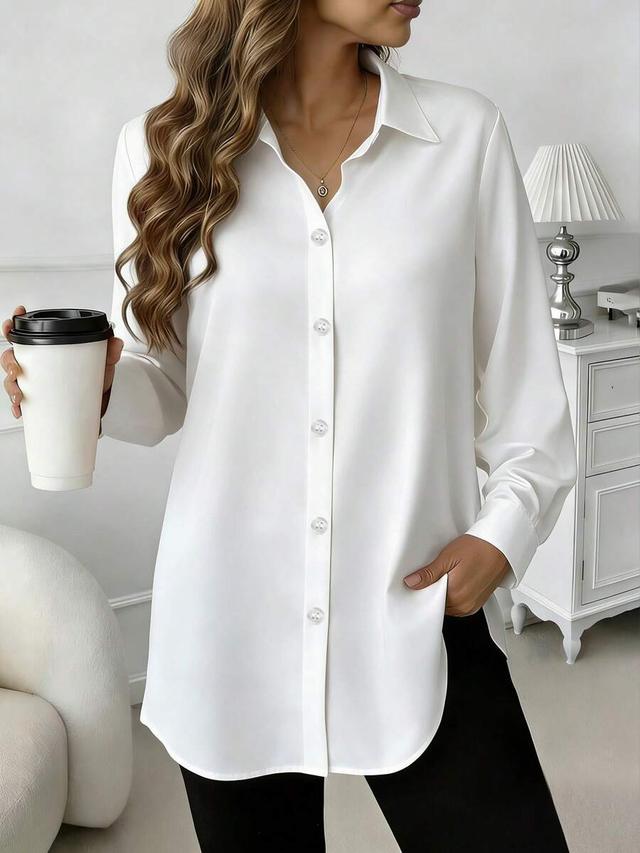 casual comfortable mid-length white button-up shirt