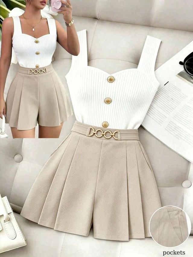 white pleated a-line shorts with metal chain detail