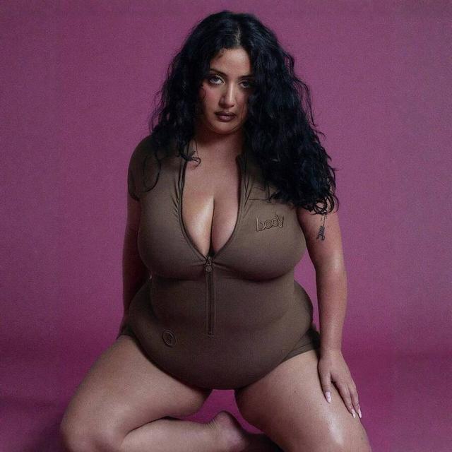 brown zip front short sleeve yoga bodysuit in olive