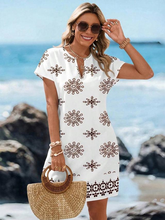 white v-neck short dress with brown geometric print