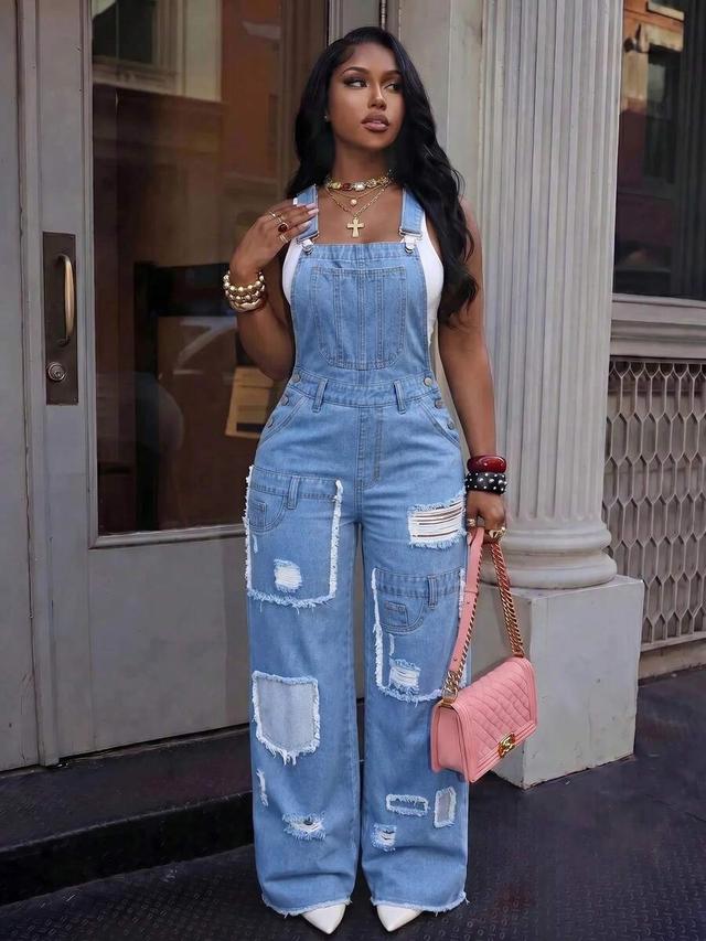 distressed light wash denim wide leg overalls