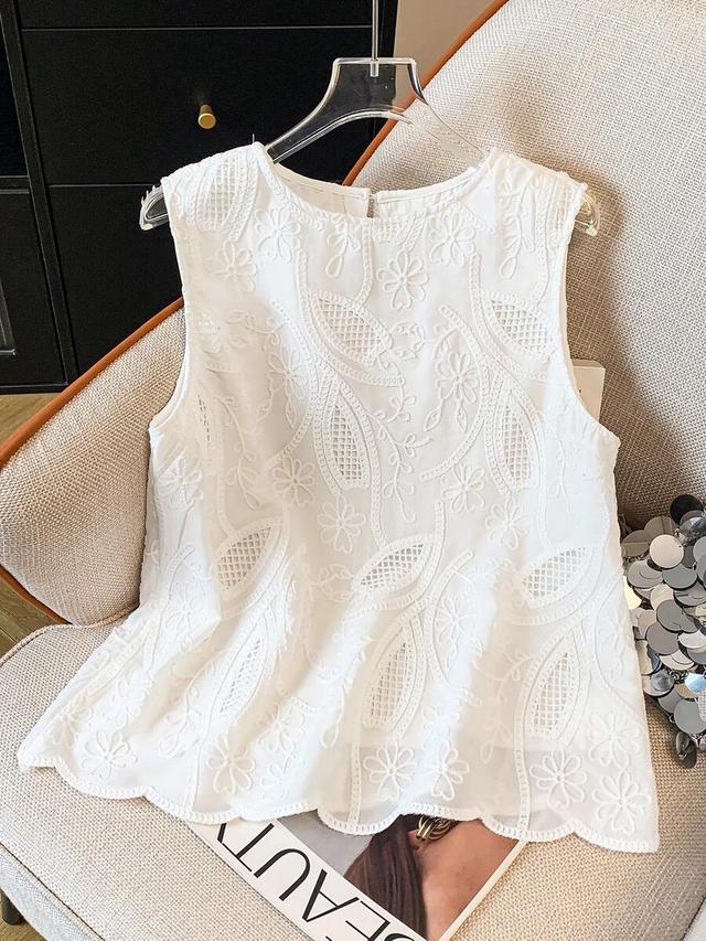 white embroidered shell trim sleeveless blouse