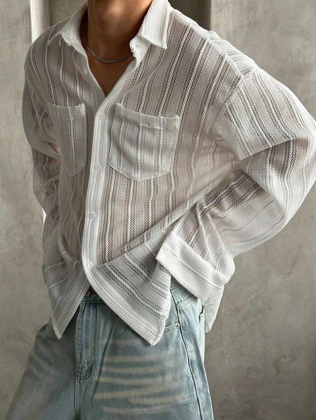textured white long sleeve button-up shirt