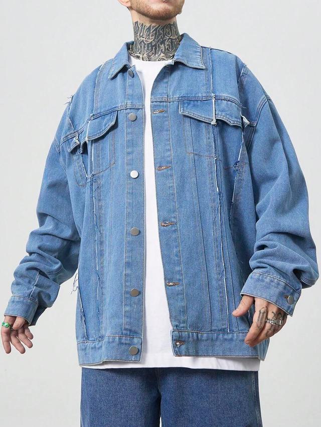 light blue oversized denim jacket with frayed patches