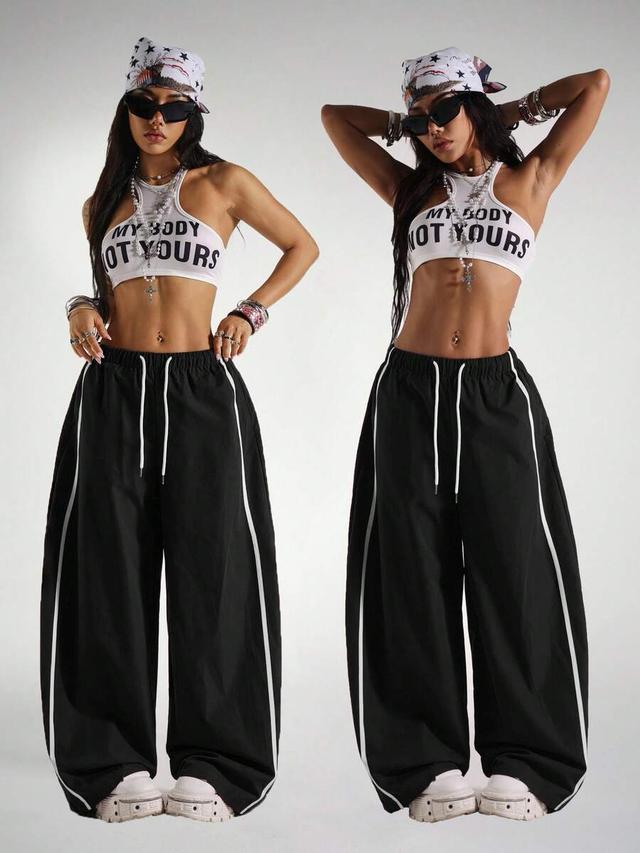 black loose fit drawstring waist contrast stripe barrel pants
