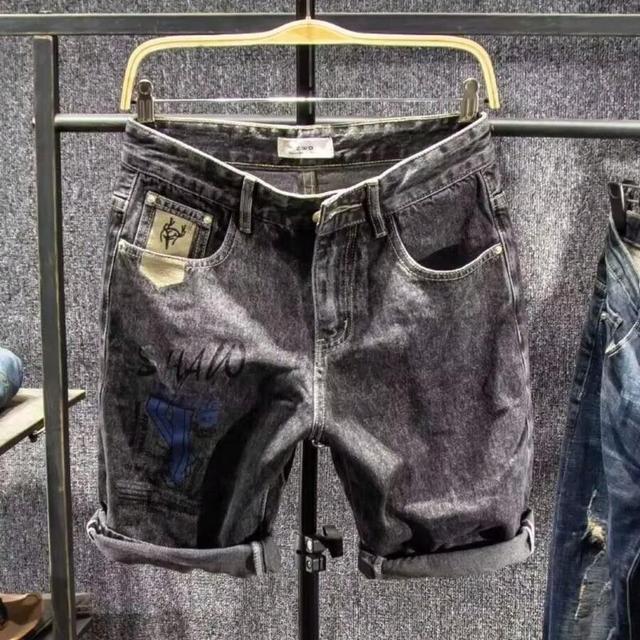 dark gray acid wash denim shorts with graphic print