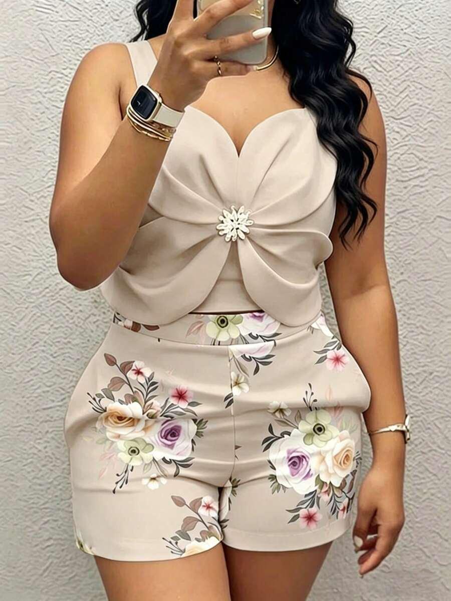 beige metal flower tank top and floral print shorts