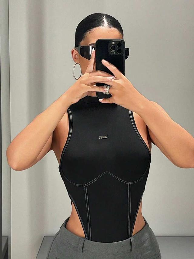 black sleeveless bodysuit with contrast stitch detailing