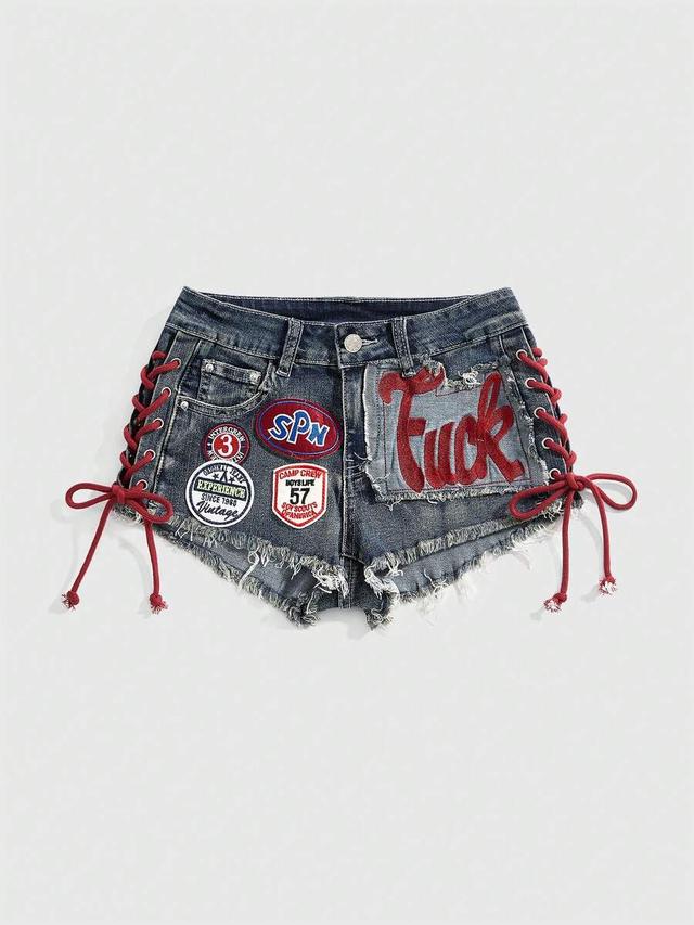 distressed denim shorts with red lace-up sides and patches