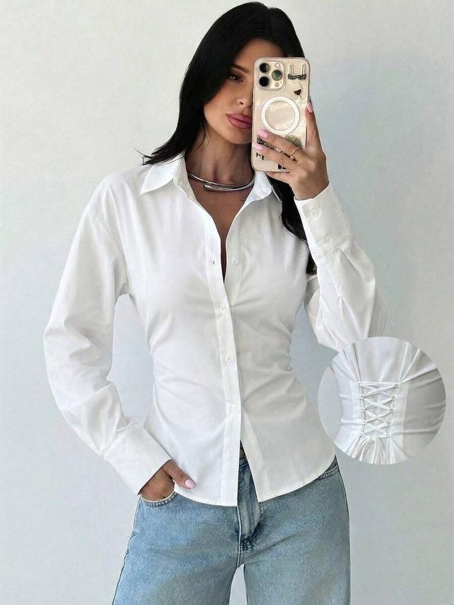 white long sleeve tie-waist button-up shirt