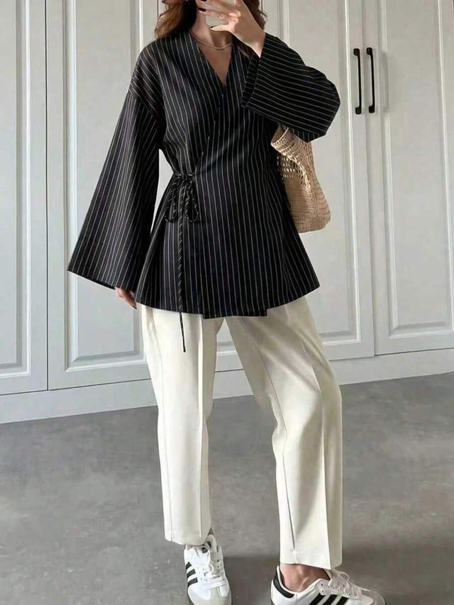 minimalist black pinstripe long sleeve tie front blouse