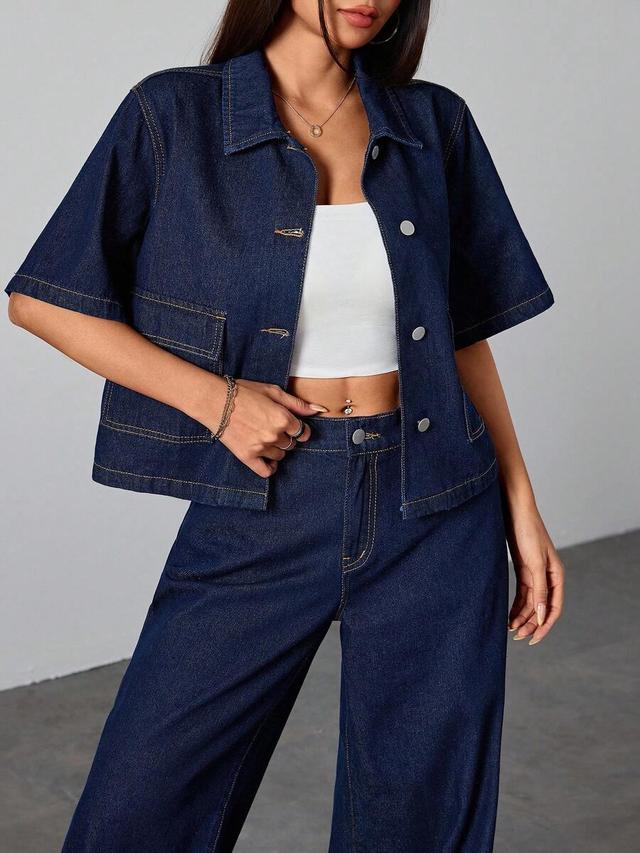 dark blue denim short-sleeved button-up shirt