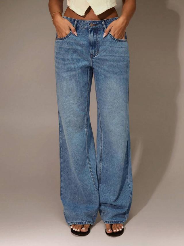 high-waisted medium wash wide-leg denim jeans
