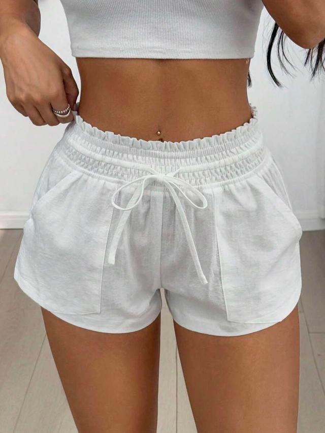 white casual drawstring waist shorts with side pockets