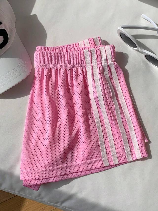 pink mesh athletic shorts with side stripes