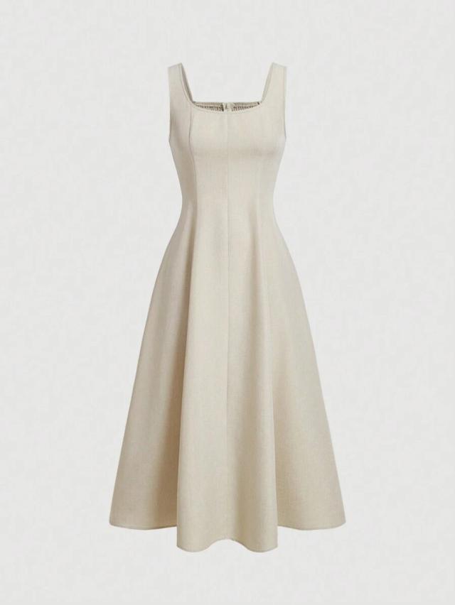 beige solid color sleeveless waist cinched sundress
