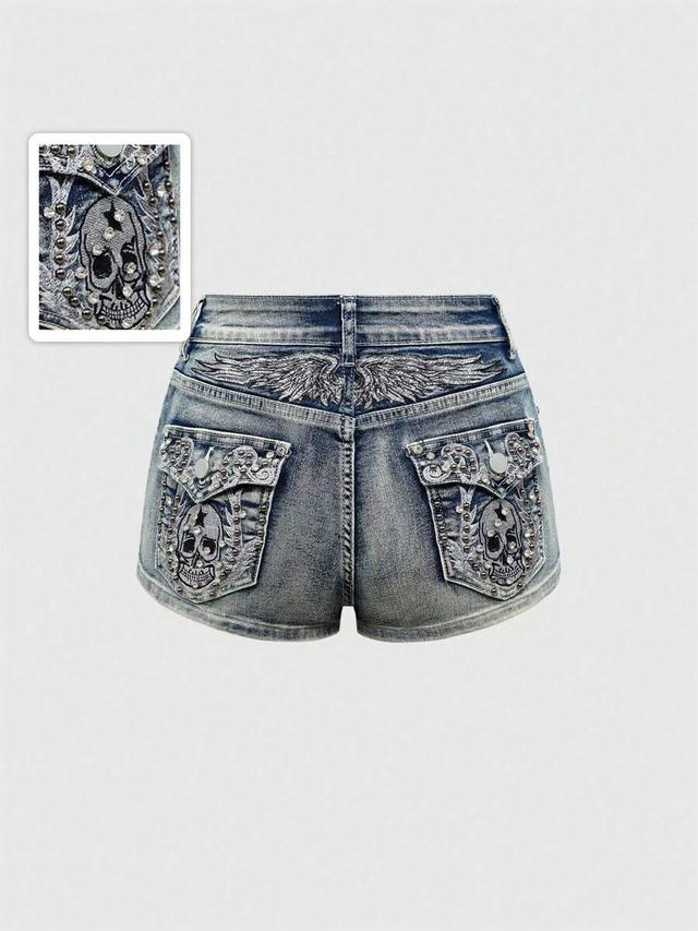 distressed denim shorts with skull and wing embroidery