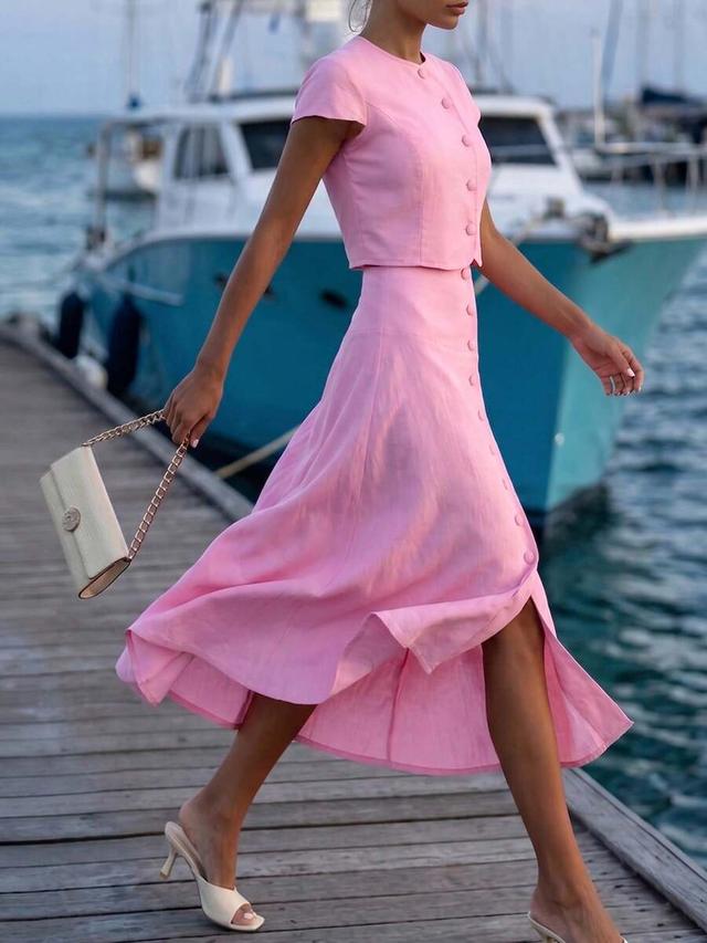 elegant soft pink button-down midi skirt