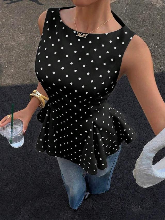 siren gaze black and white polka dot peplum tank