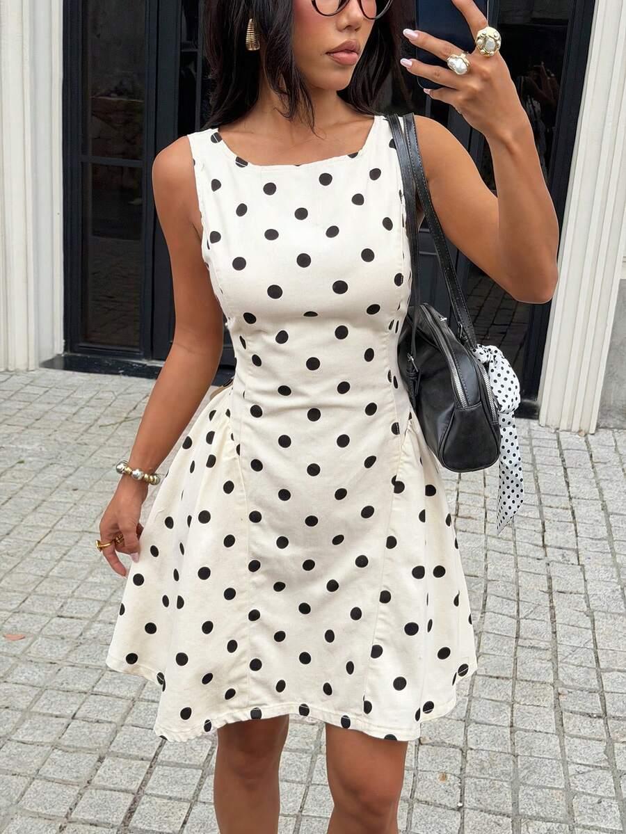 sleeveless white polka dot mini denim dress