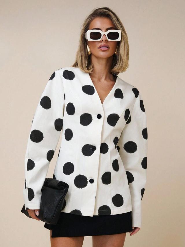 elegant white and black polka dot commuter blouse