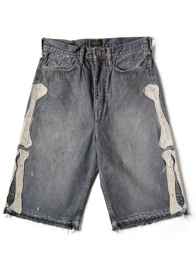 grey denim shorts with crochet bone appliqué