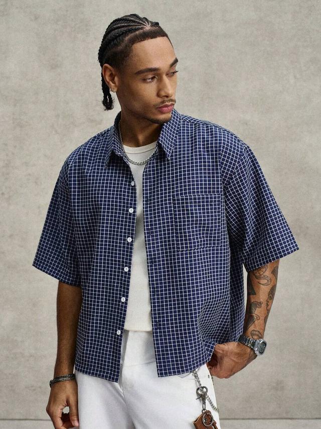 navy blue plaid short sleeve boxy shirt