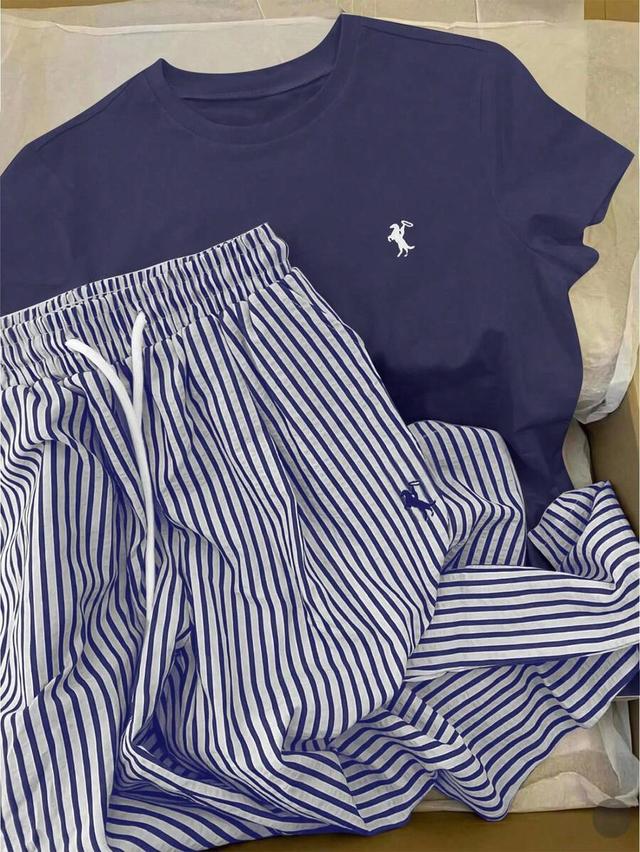 navy knight print t-shirt and striped drawstring pants