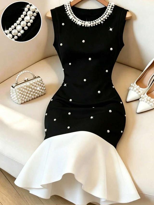 black white and white pearl embellished mermaid dress