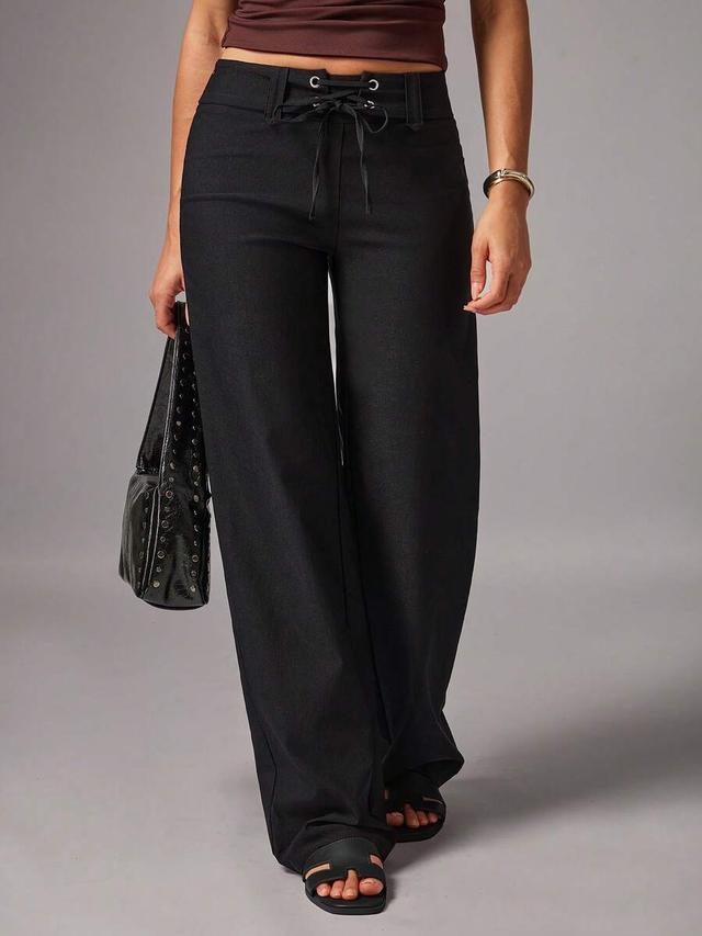 avenya women's solid black eyelet lace-up straight leg pants