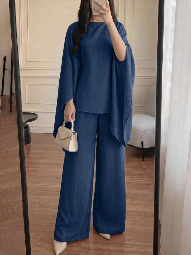 women's navy blue cinched waist batwing sleeve top