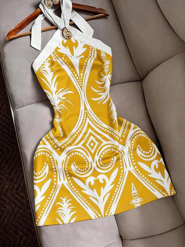 yellow and white patterned halter neck mini dress