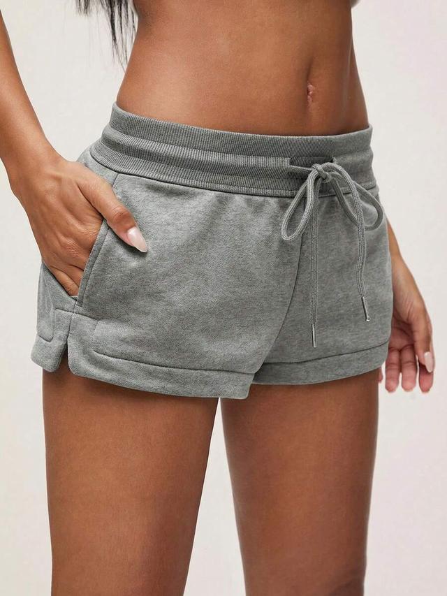 grey low-waist lounge shorts with side slits