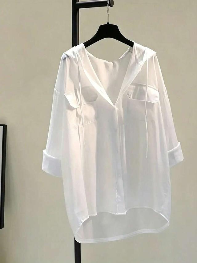white hooded shirt with drop shoulders