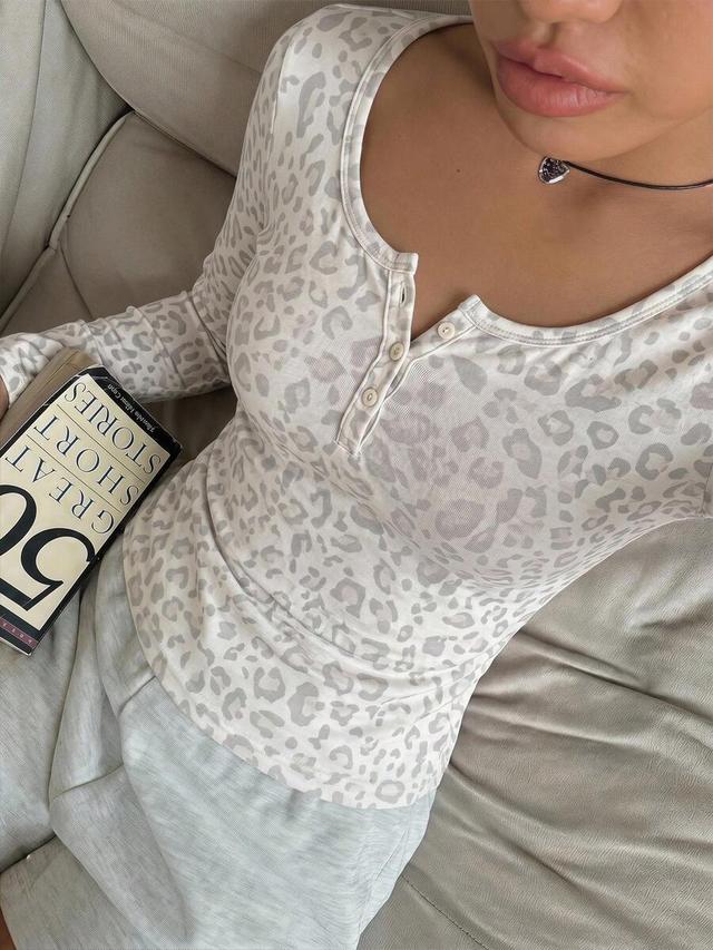 off-white vintage leopard print long sleeve henley top
