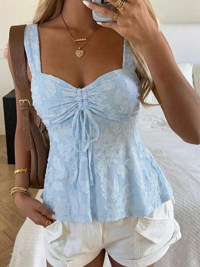 light blue floral textured tie front camisole