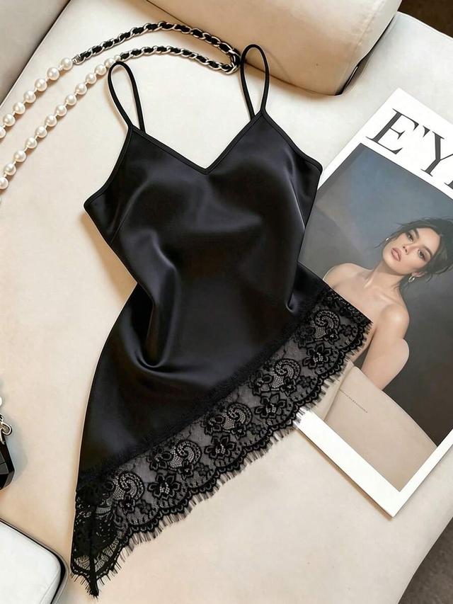 black satin v-neck camisole with asymmetrical lace hem
