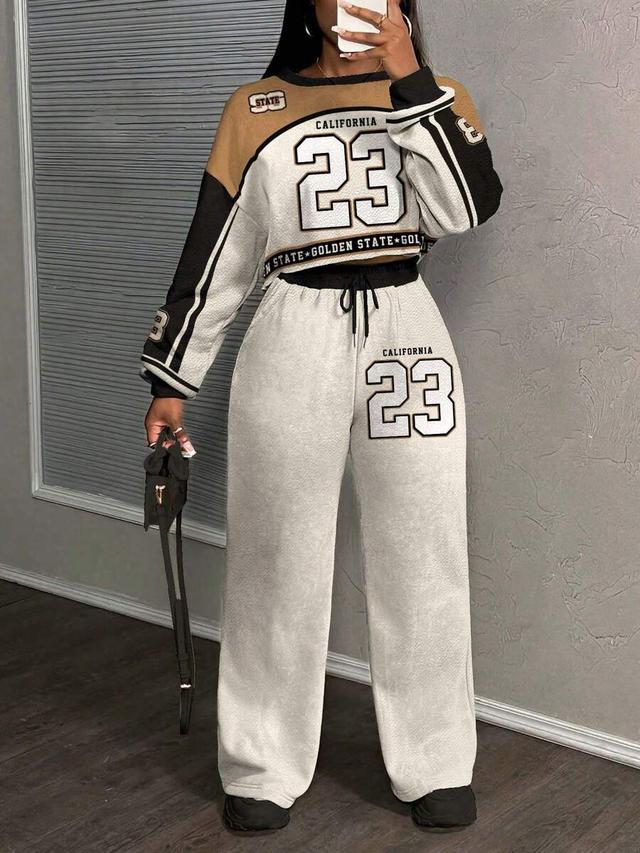 white baggy graphic print casual trousers