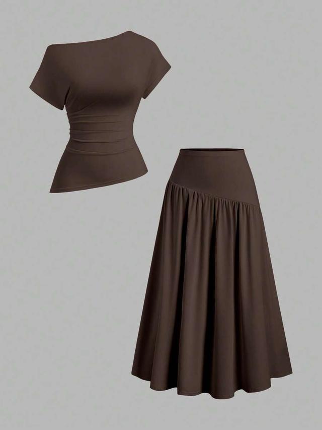 brown asymmetric shoulder top and pleated maxi skirt set