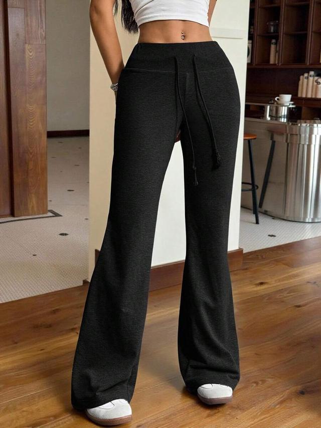 black drawstring waist flare leg sweatpants