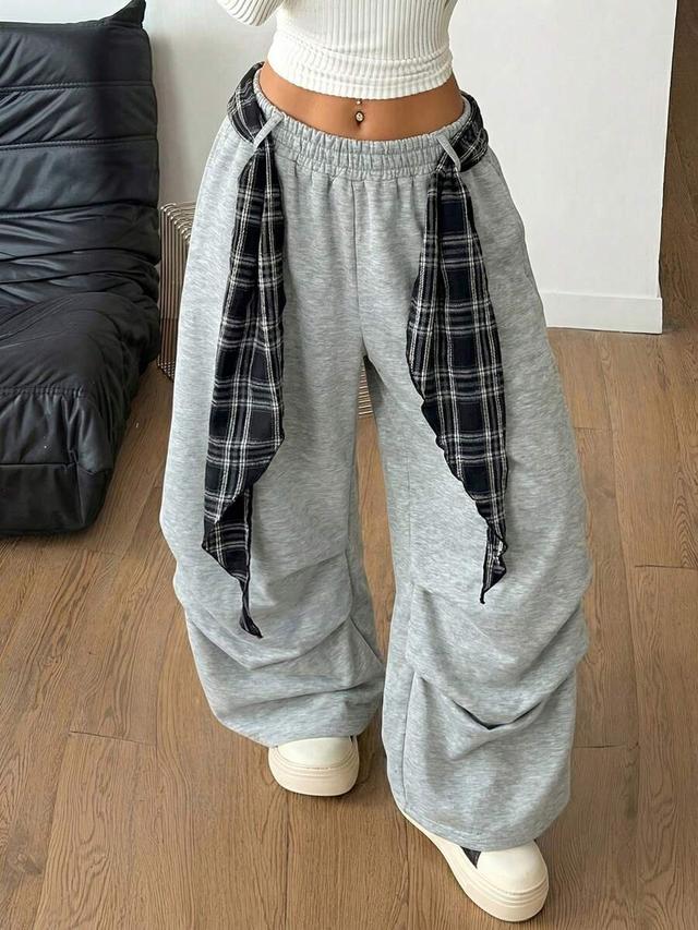 grey baggy plaid tie-waist parachute jogger pants